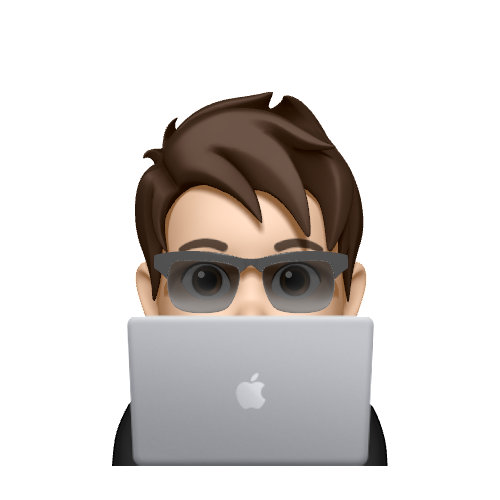 Memoji working on a macbook, wearing sunglasses because of light mode